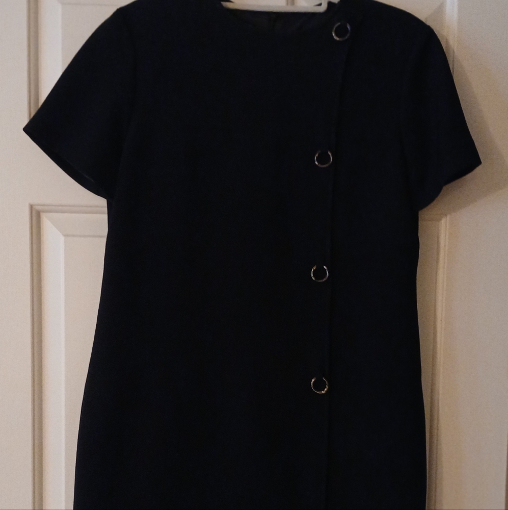 Chic Black Dress with Ring Accents